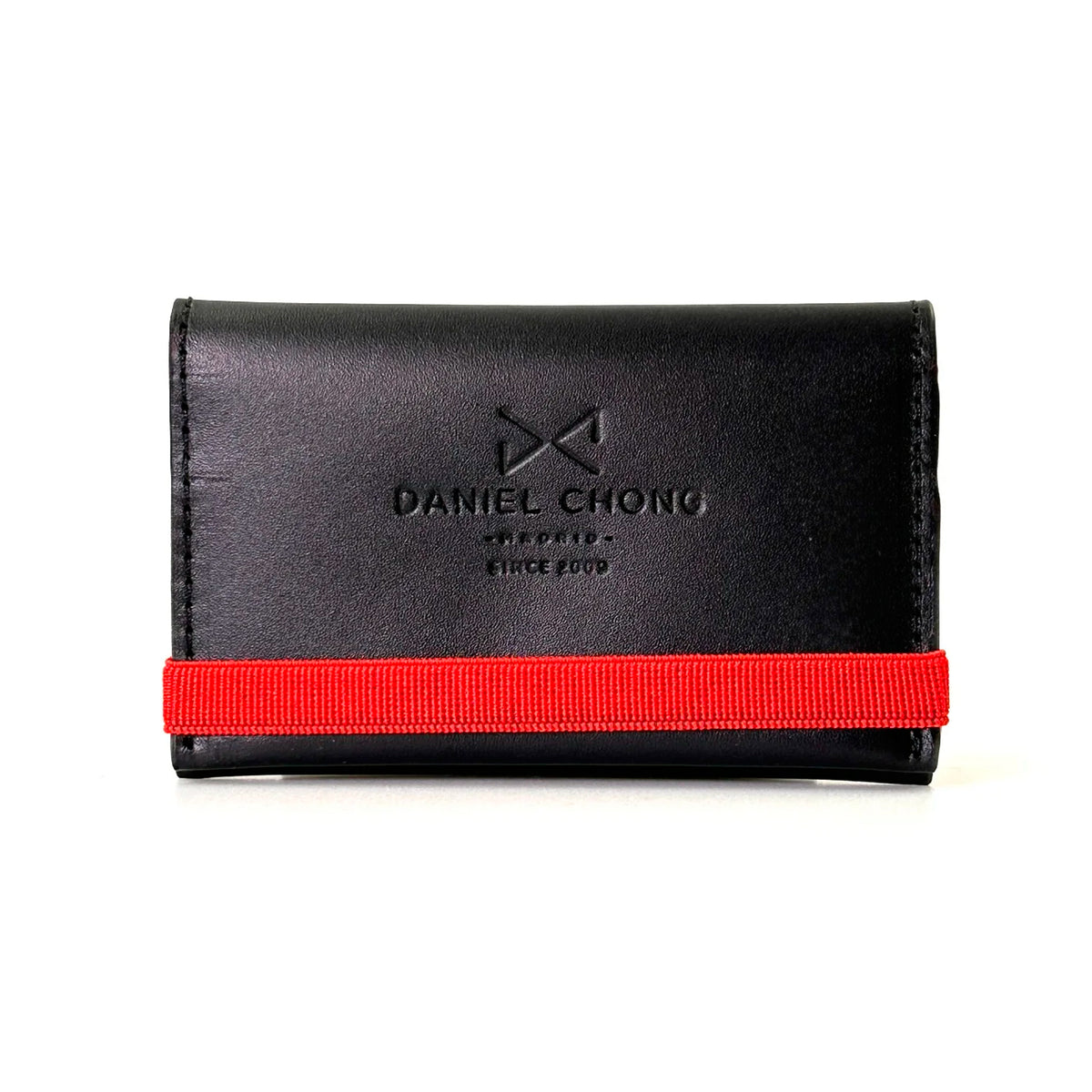 Tarjetero con goma de Daniel Chong - Negro