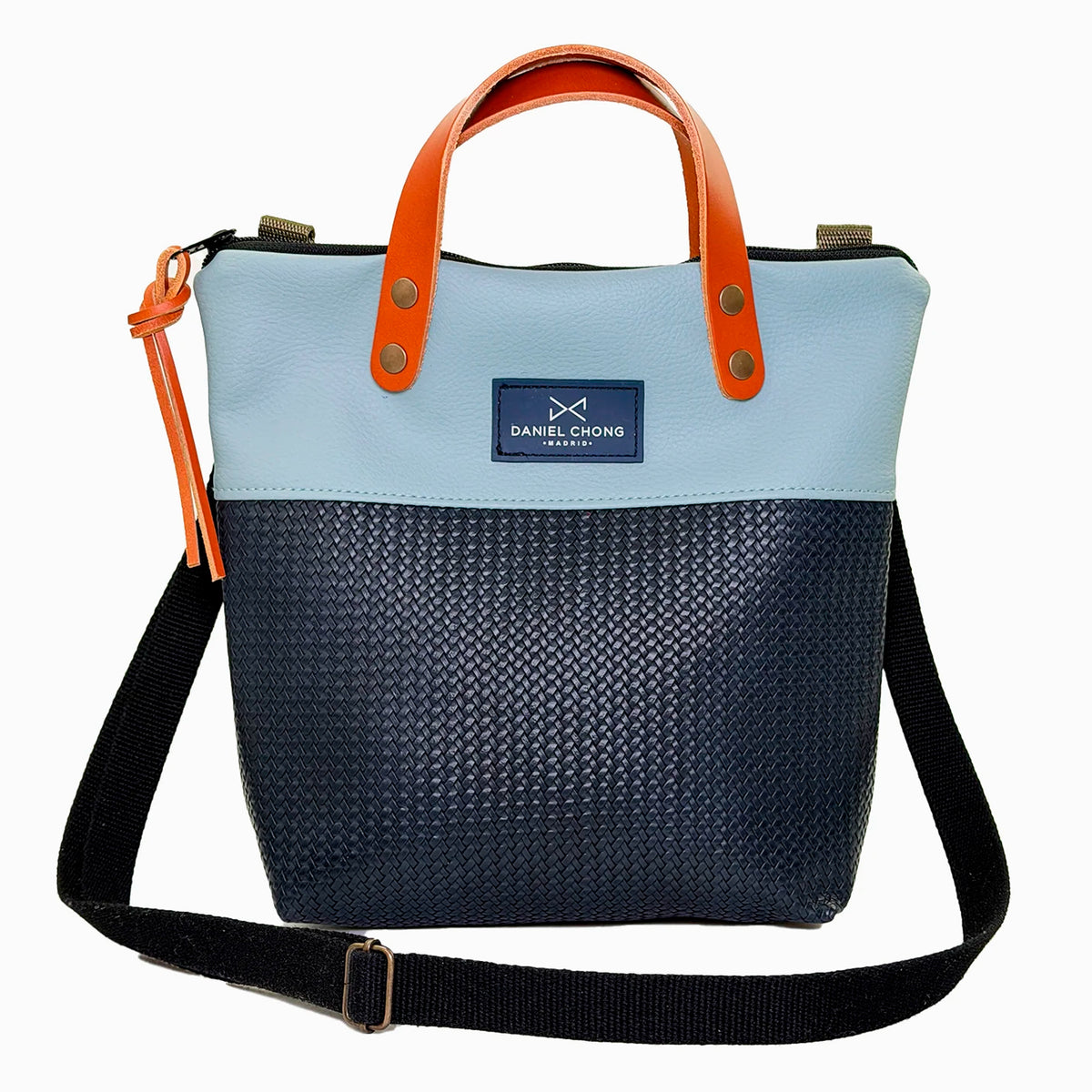 Bandolera mini impermeable con asas Daniel Chong - Asas marrón cuerpo azul y azul marino