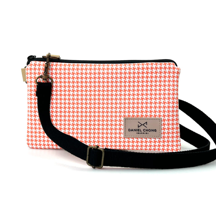 Traveler Mini Impermeable Daniel Chong - Pata de gallo naranja