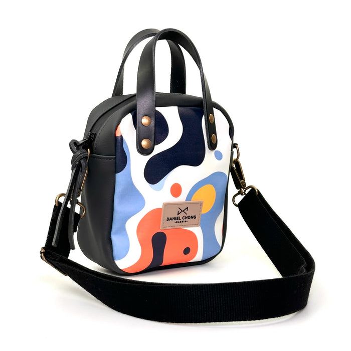 Bandolera Urban Box Mini con asas impermeable Daniel Chong - Abstract y negro