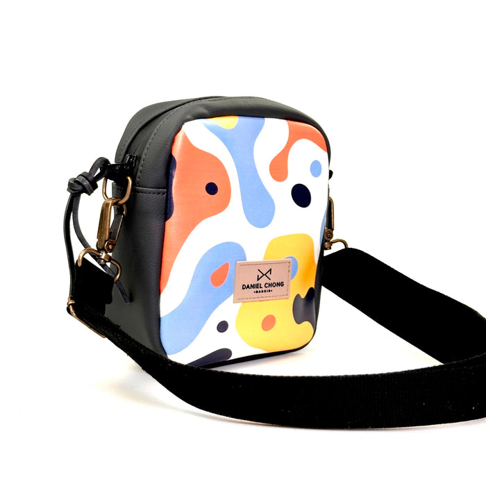 Bandolera Urban Box Mini impermeable Daniel Chong - Abstract y negro