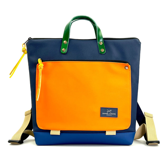 Mochila Book Holder Cuadrada Impermeable con bolsillo extra Daniel Chong - Azul con bolsillo naranja