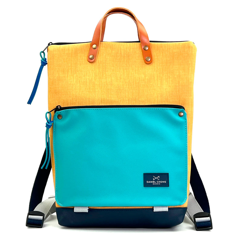 Mochila Book Holder Impermeable con bolsillo extra Daniel Chong - Amarilla con bolsillo azul