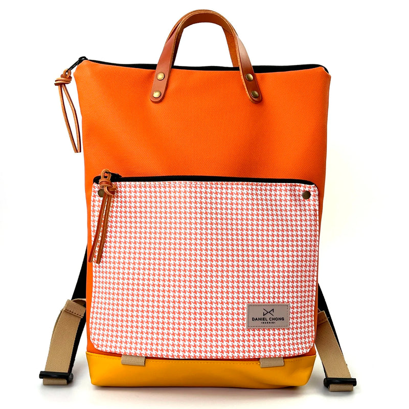 Mochila Book Holder Impermeable con bolsillo extra Daniel Chong - Naranja con bolsillo pata de gallo