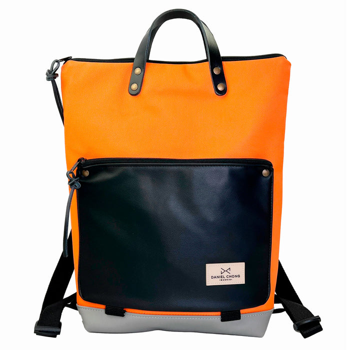 Mochila Book Holder Impermeable con bolsillo extra Daniel Chong - Naranja con bolsillo negro