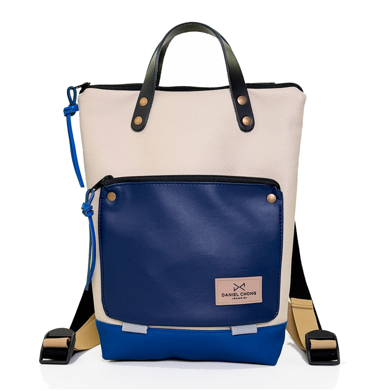 Mochila Mini Book Holder Impermeable con bolsillo extra Daniel Chong - Beige con bolsillo azul