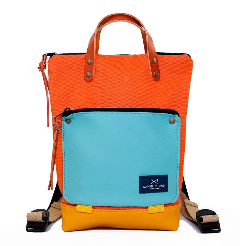 Mochila Mini Book Holder Impermeable con bolsillo extra Daniel Chong - Naranja con bolsillo azul