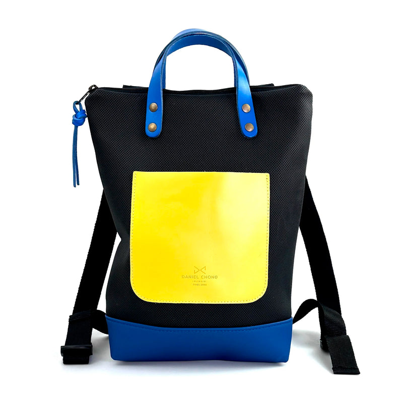 Mochila Mini Impermeable con bolsillo extra Daniel Chong - Negro con bolsillo amarillo