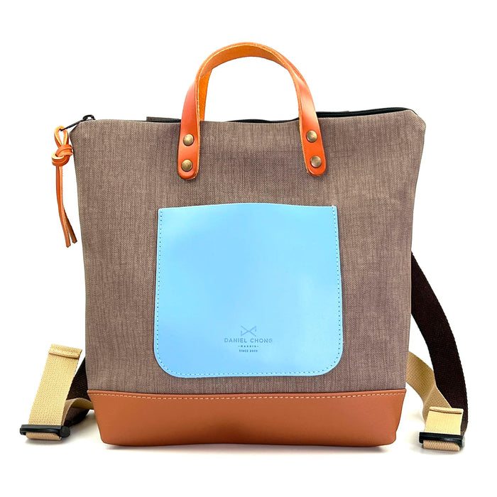 Mochila Mini Cuadrada Impermeable con bolsillo extra Daniel Chong - Gris con bolsillo azul