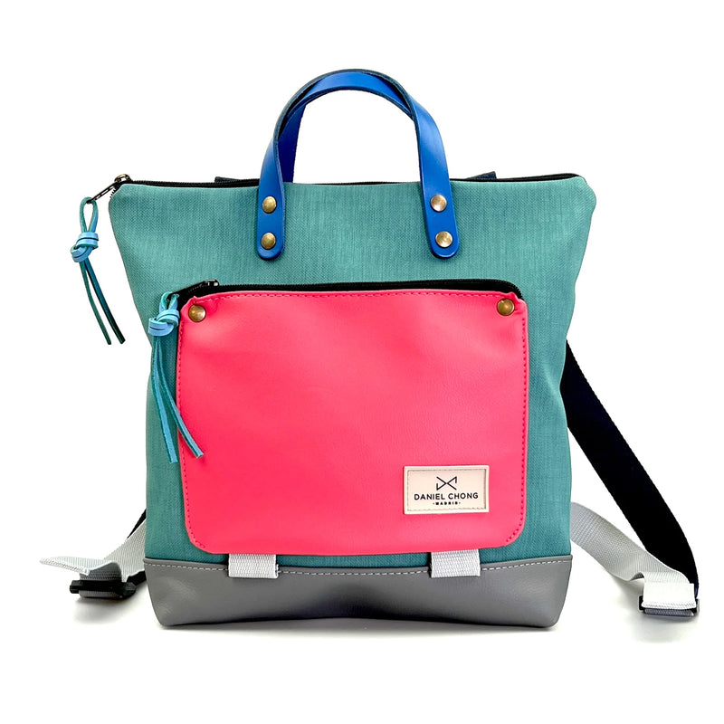 Mochila Mini Book Holder Cuadrada Impermeable con bolsillo extra Daniel Chong - Turquesa con bolsillo fucsia