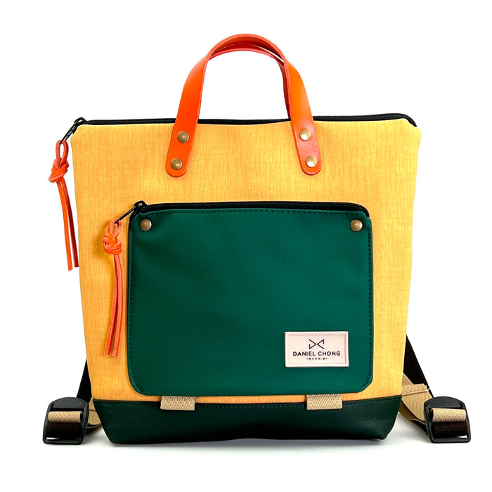 Mochila Mini Book Holder Cuadrada Impermeable con bolsillo extra Daniel Chong - Amarillo con bolsillo verde