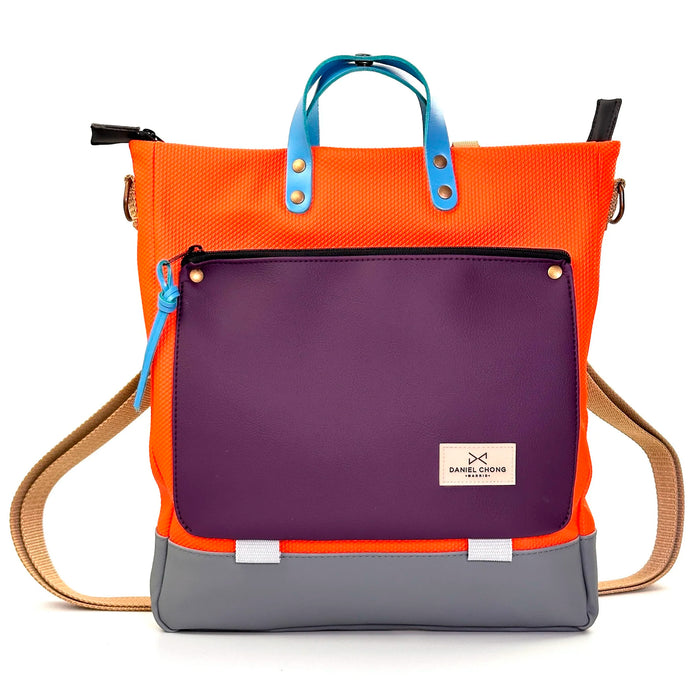 Bolso-mochila Worker Bag de Daniel Chong - Naranja con bolsillo violeta
