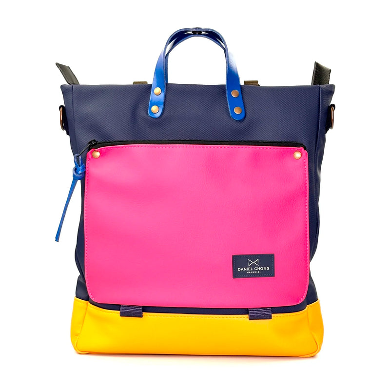 Bolso-mochila Worker Bag de Daniel Chong - Azul con bolsillo fucsia