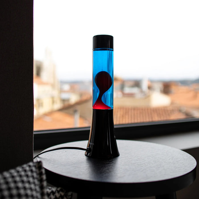 Lámpara de lava mini Fisura - base negra, líquido azul y lava roja