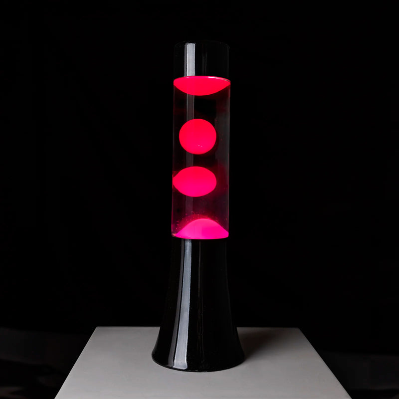 Lámpara de lava mini Fisura - Base negra, líquido transparente y lava rosa