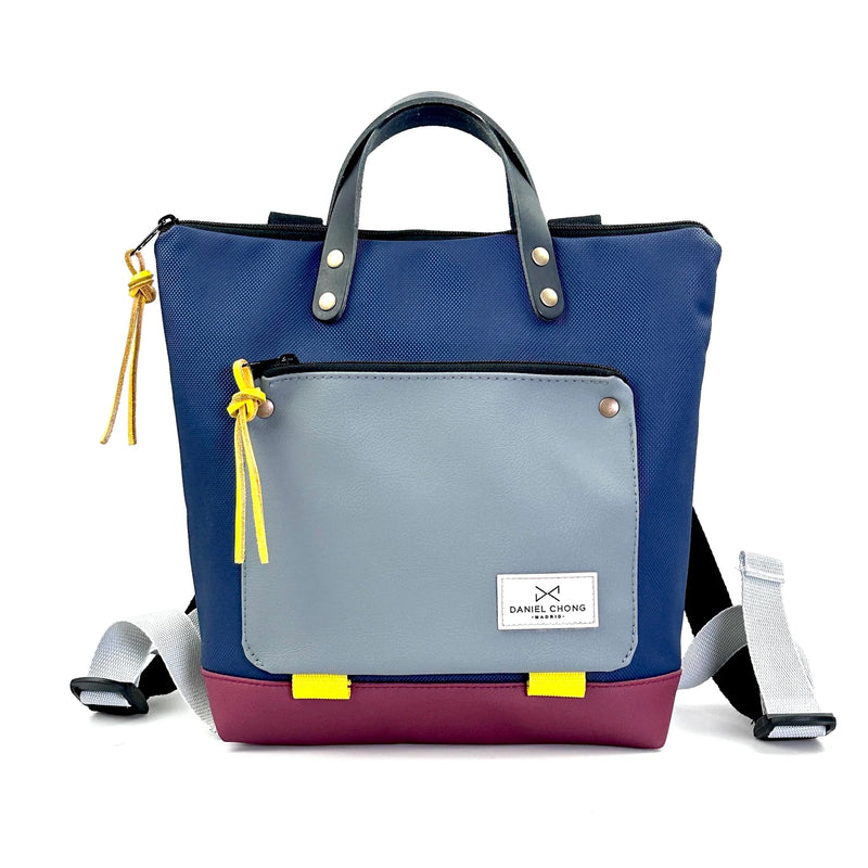 Mochila Mini Book Holder Cuadrada Impermeable con bolsillo extra Daniel Chong - Azul con bolsillo gris