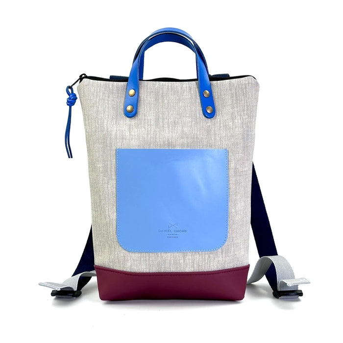 Mochila Mini Impermeable con bolsillo extra Daniel Chong - Gris con bolsillo azul