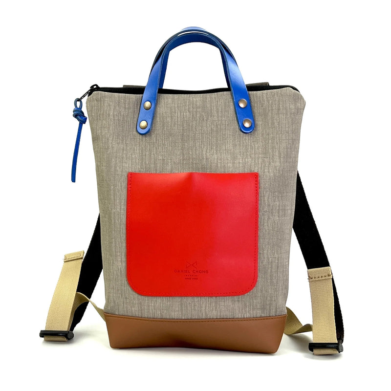Mochila Mini Impermeable con bolsillo extra Daniel Chong - Gris con bolsillo rojo