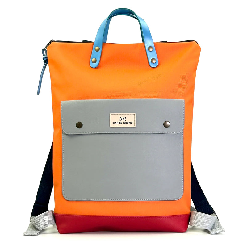 Mochila Slim Solapa Impermeable con bolsillo extra Daniel Chong - Naranja con bolsillo gris