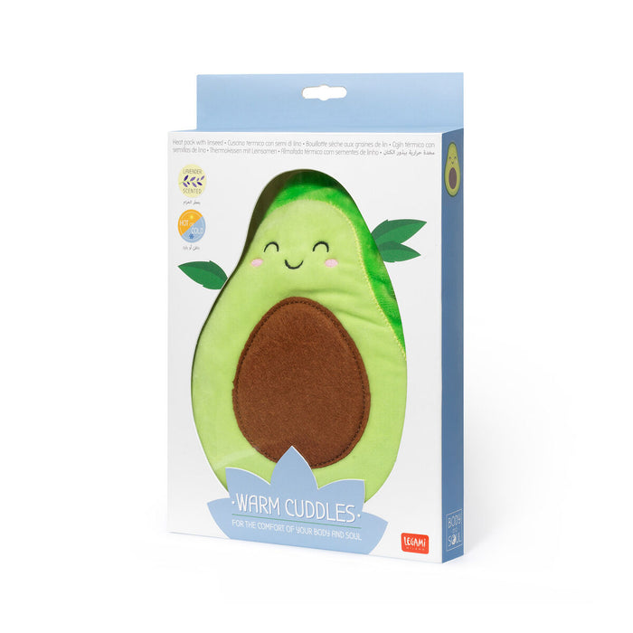 Cojín térmico de semillas de lino con forma de medio aguacate. Cojín térmico en forma de aguacate con carita sonriente y mofletes colorados. Bolsa de semillas con funda extraíble en forma de aguacate.