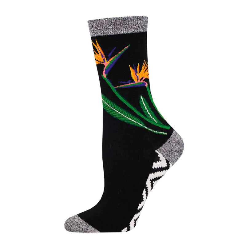 Calcetines de fondo negro con estampado de flores. Con puntera talón y remate en color gris y suela en estampado geométrico en blanco y negro.
