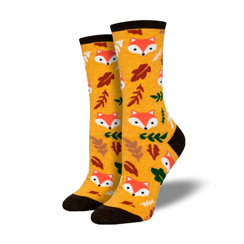 Calcetines de algodón amarillos con dibujos otoñales. Calcetines amarillos con puntera, talón y remante en negro, con dibujos de caras de zorro y hojas de otoño cuquis.