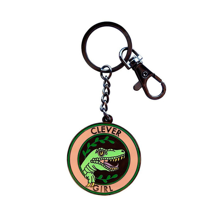 Llavero redondo de Jurassic Park. Llavero con la imagen de un velociraptor y el texto "clever girl".