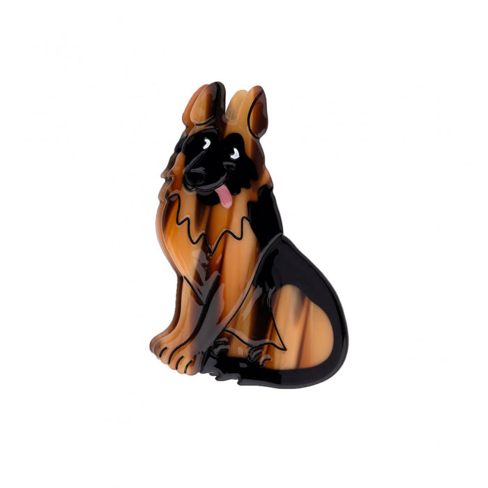 pinza para el pelo en forma de pastor aleman en plano sobre fondo blanco