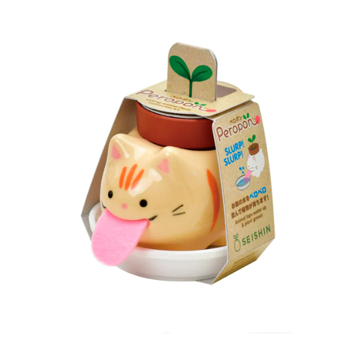 Kit de cultivo de menta con maceta en forma de gato rayado naranja, bandeja de plástico blanco, tierra y semillas.