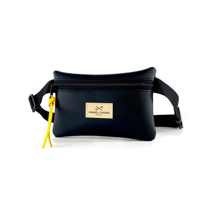 Riñonera impermeable Daniel Chong - Negra con detalle amarillo