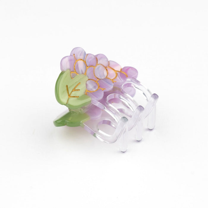 Pinza mini para el pelo en forma de racimo de uvas. Pinza original y divertida fabricada con acetato de celulosa reciclado y biodegradable.