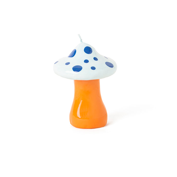 Vela decorativa en forma de seta con tallo amarillo y parte superior azul. Vela decorativa en forma de amanita muscaria en tonos azules y amarillos.