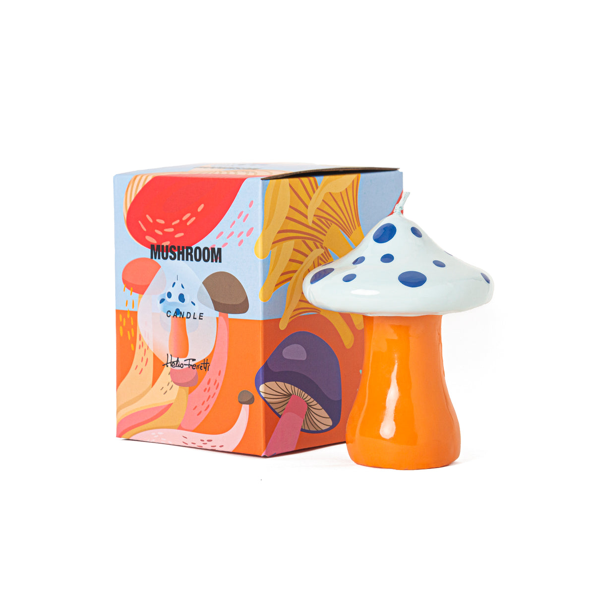 Vela decorativa en forma de seta con tallo amarillo y parte superior azul. Vela decorativa en forma de amanita muscaria en tonos azules y amarillos.