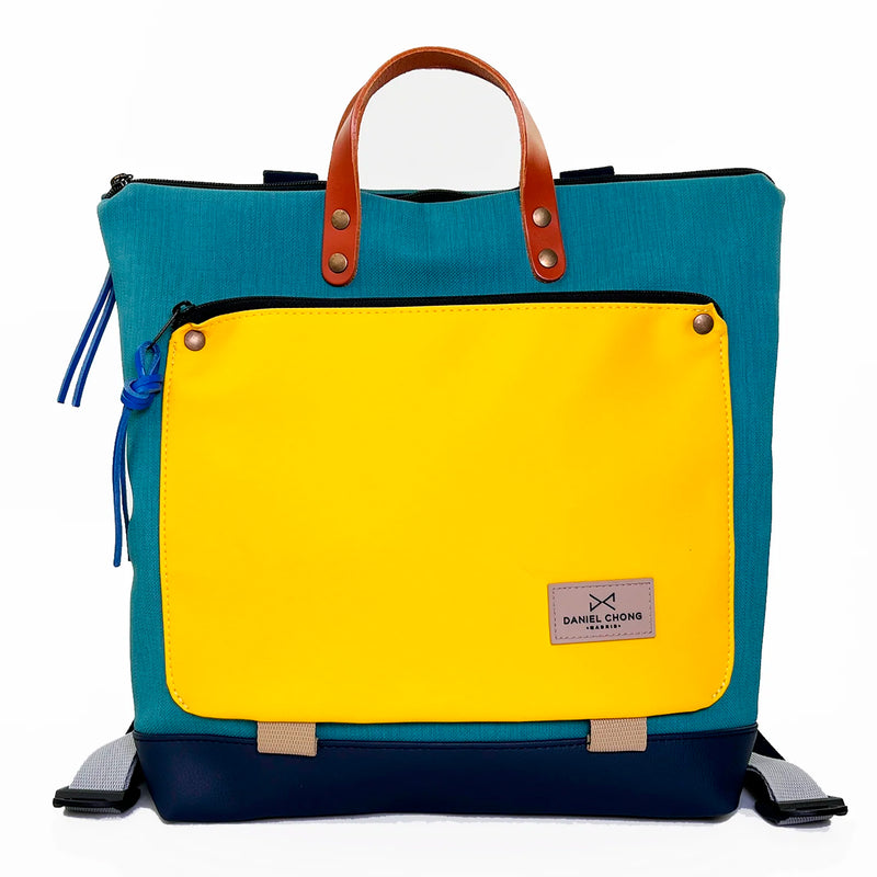 Mochila Book Holder Cuadrada Impermeable con bolsillo extra Daniel Chong - Turquesa con bolsillo amarillo