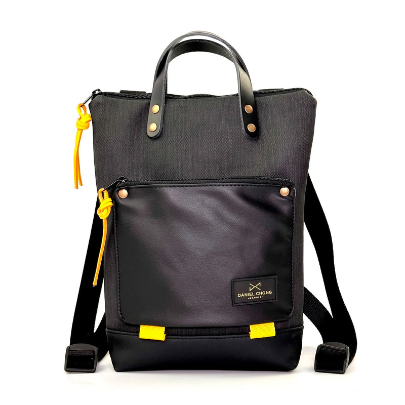 Mochila Mini Book Holder Impermeable con bolsillo extra Daniel Chong - Negro