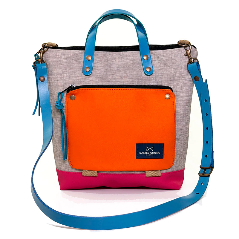 Bandolera Book Holder Cuadrada Impermeable con bolsillo extra Daniel Chong - Gris con bolsillo naranja