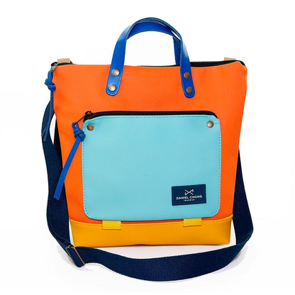 Bandolera Book Holder Cuadrada Impermeable con bolsillo extra Daniel Chong - Naranja con bolsillo azul