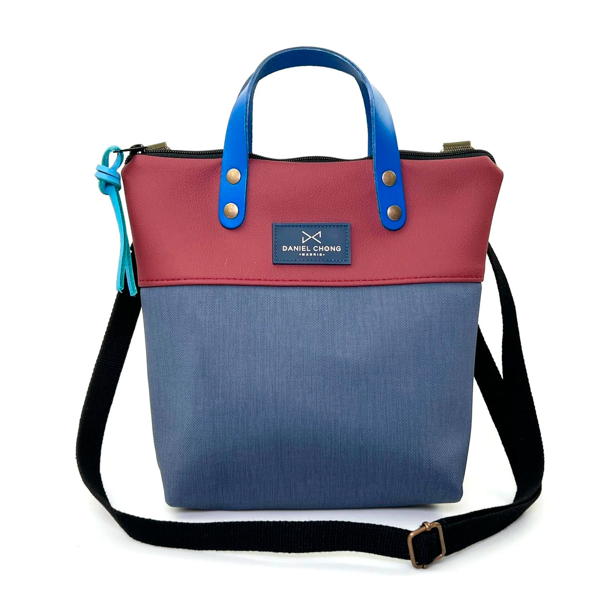 Bandolera mini impermeable con asas Daniel Chong - Asas azul cuerpo rojo y azul