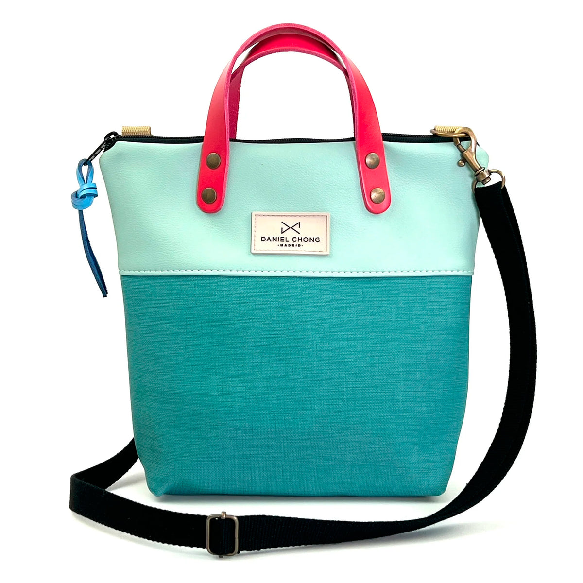 Bandolera mini impermeable con asas Daniel Chong - Asas fucsia cuerpo azul y turquesa