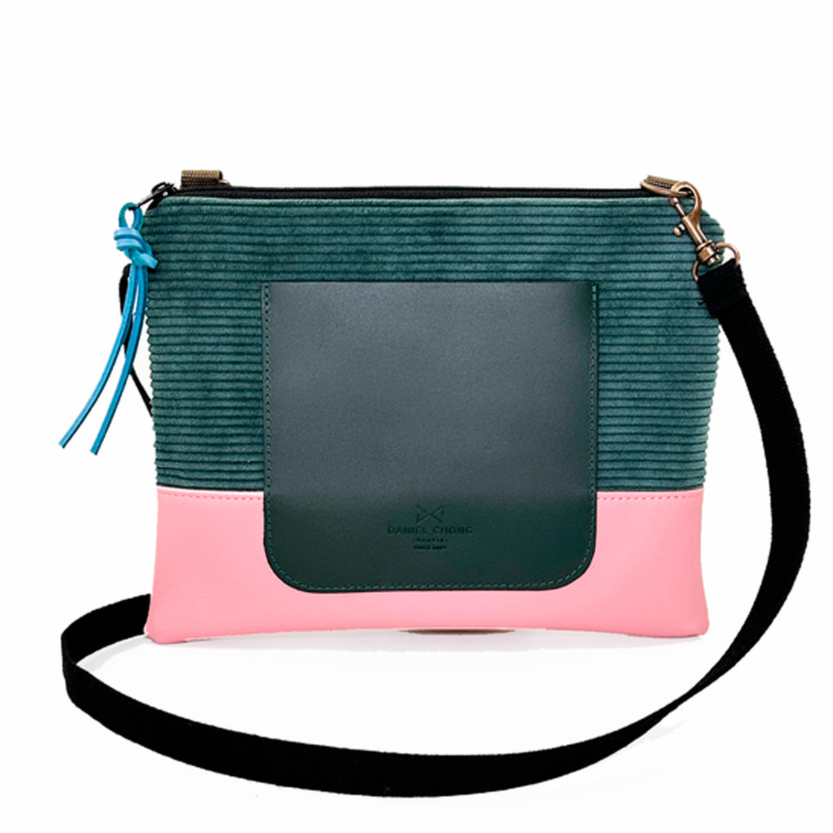Bandolera mini loneta con bolsillo Daniel Chong - Pana azul, base rosa y bolsillo negro