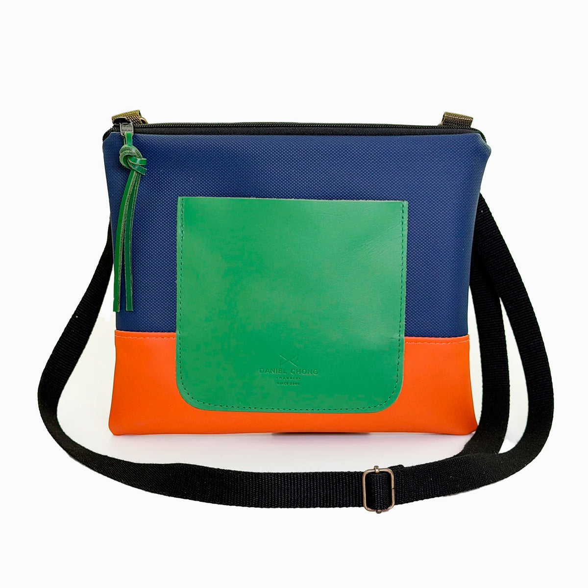 Bandolera mini impermeable con bolsillo Daniel Chong - Azul y naranja con bolsillo verde