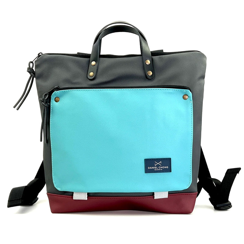 Mochila Book Holder Cuadrada Impermeable con bolsillo extra Daniel Chong - Negra con bolsillo azul