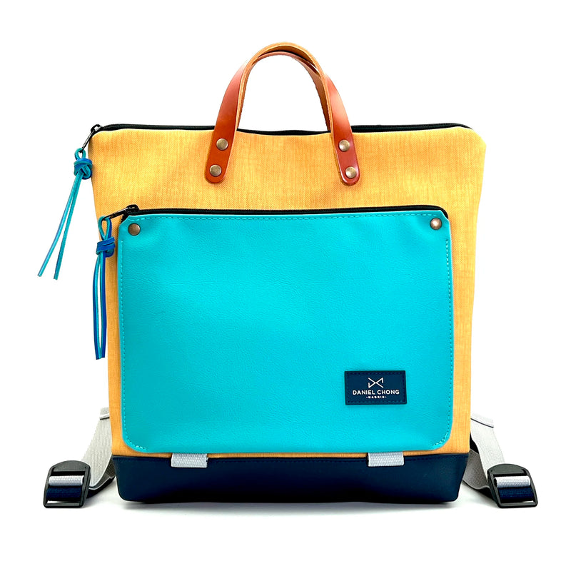 Mochila Book Holder Cuadrada Impermeable con bolsillo extra Daniel Chong - Amarilla con bolsillo azul
