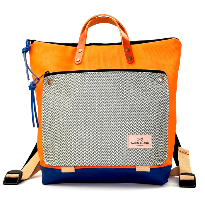 Mochila Book Holder Cuadrada Impermeable con bolsillo extra Daniel Chong - Naranja y bolsillo espiga