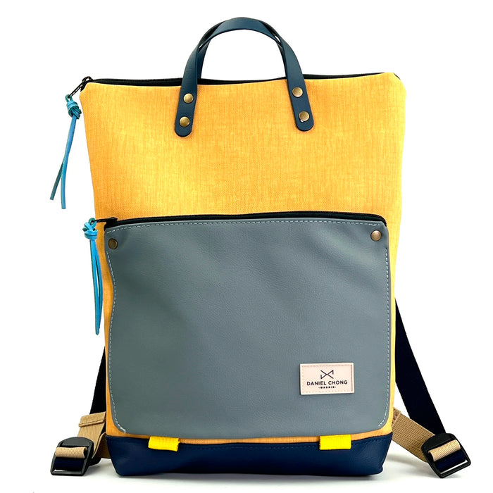 Mochila Book Holder Impermeable con bolsillo extra Daniel Chong - Amarillo con bolsillo gris