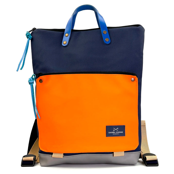 Mochila Book Holder Impermeable con bolsillo extra Daniel Chong - Azul con bolsillo naranja