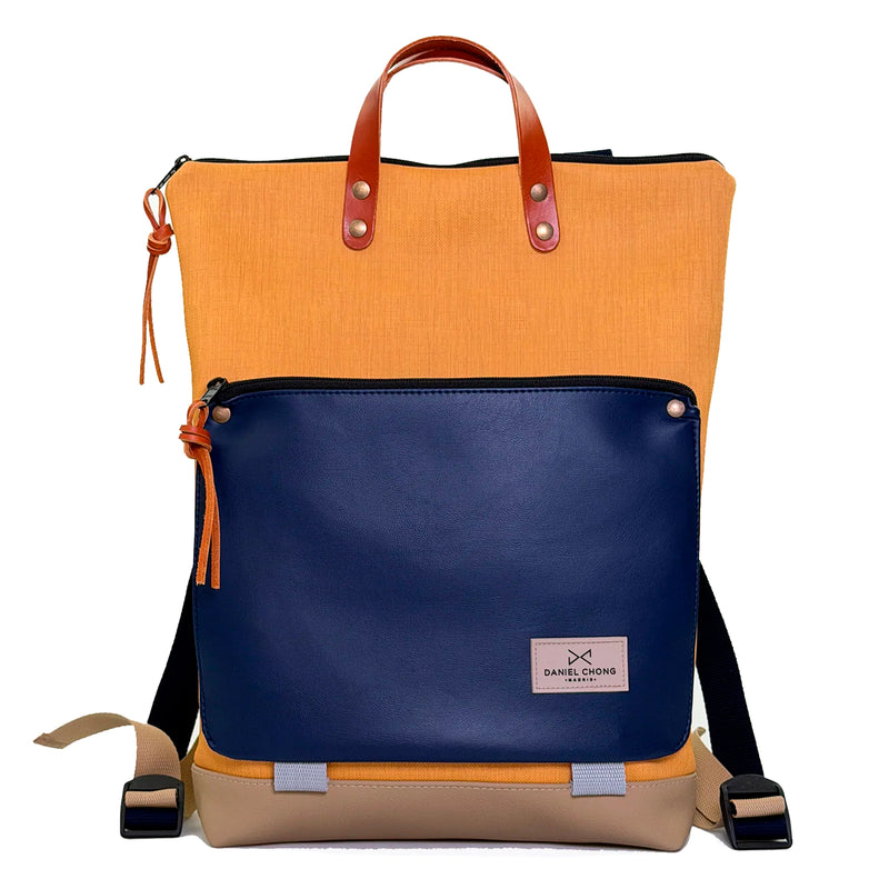 Mochila Book Holder Impermeable con bolsillo extra Daniel Chong - Mostaza con bolsillo azul