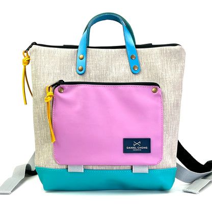 Mochila Mini Book Holder Cuadrada Impermeable con bolsillo extra Daniel Chong - Gris con bolsillo lila