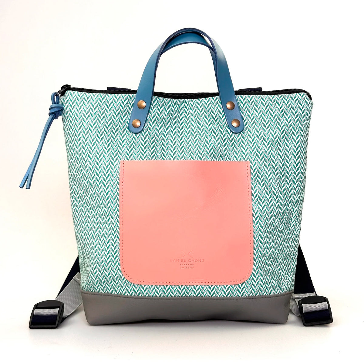 Mochila Mini Cuadrada Impermeable con bolsillo extra Daniel Chong - Espiga turquesa con bolsillo rosa