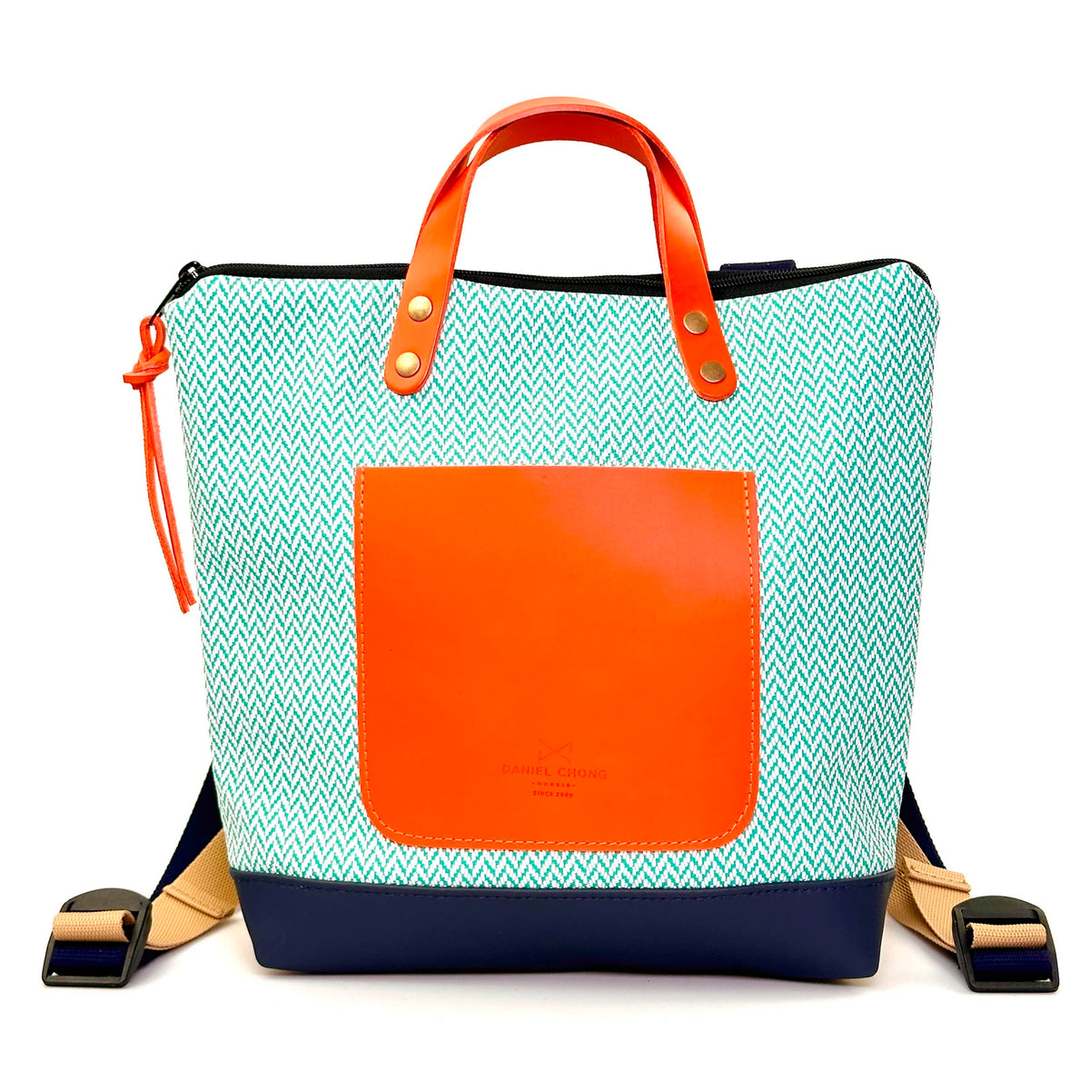 Mochila Mini Cuadrada Impermeable con bolsillo extra Daniel Chong - Espiga turquesa con bolsillo naranja